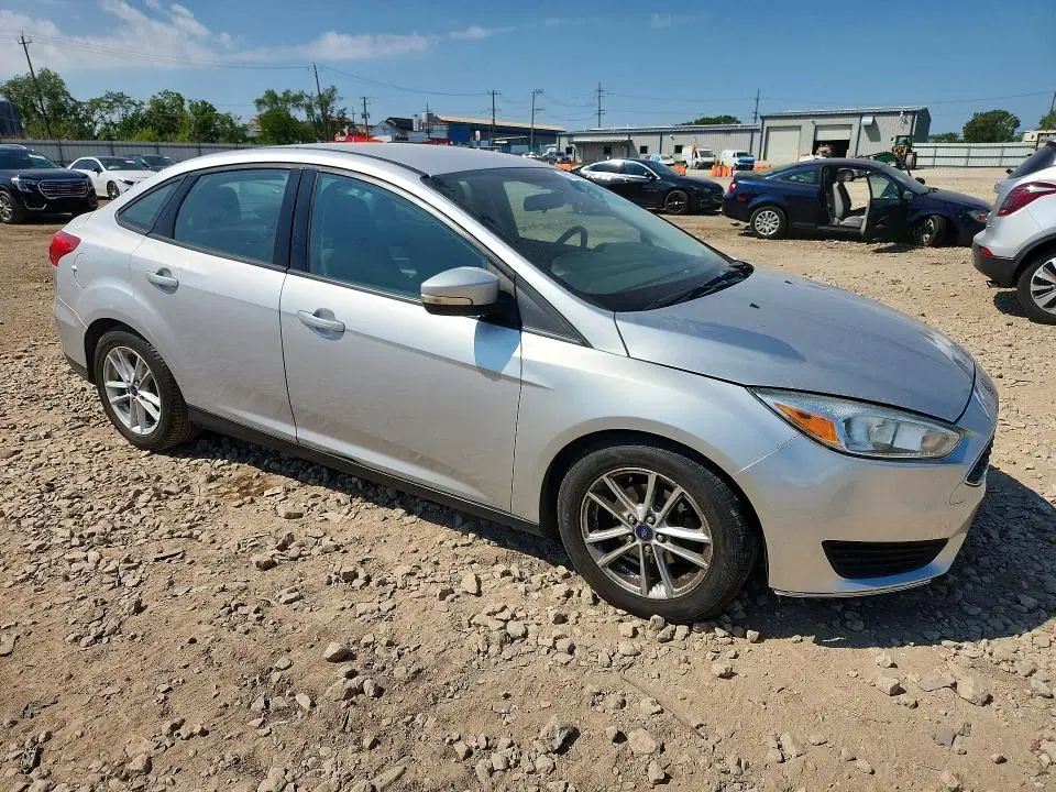 2015 FORD FOCUS VIN 1FADP3F26FL360359 фото 4
